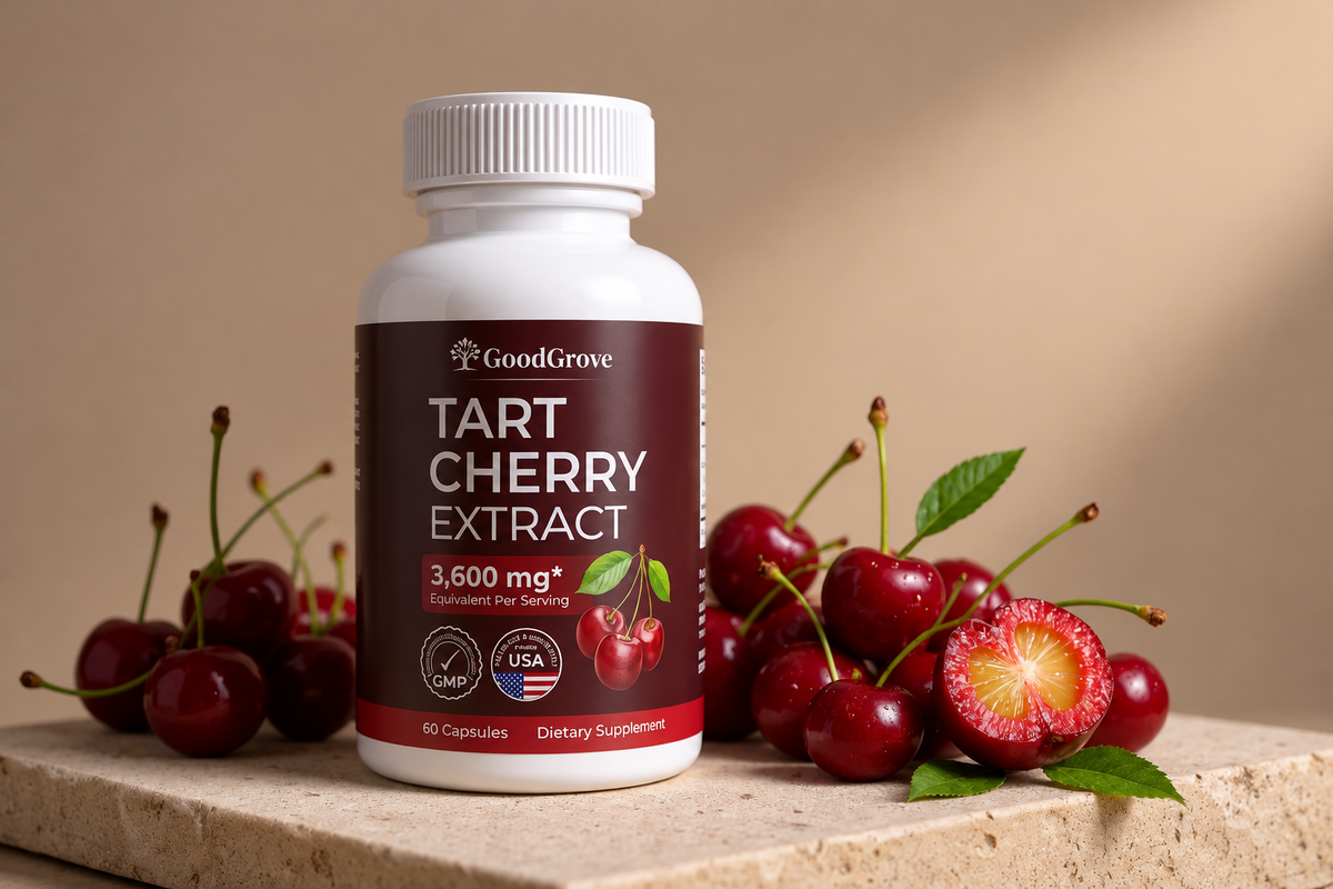 Abmus Tart Cherry Extract bottle surrounded by fresh tart cherries.